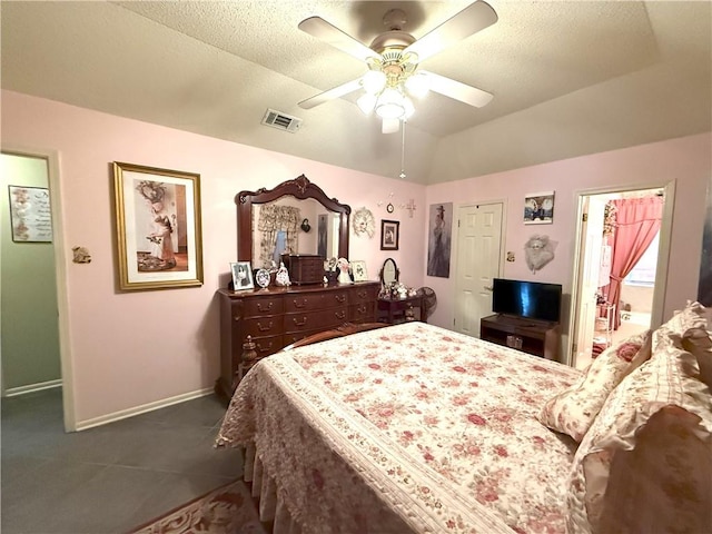 2053 Saulet Pl, Harvey, LA 70058 - bedroom with vaulted ceiling, dark carpet, and ceiling fan
