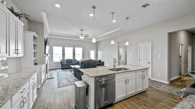 5520 Wake Reserve Rd, Slidell, LA 70461 - kitchen featuring a sink, stainless steel dishwasher, a ceiling fan, and white cabinetry