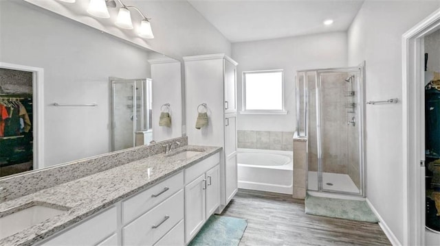 5520 Wake Reserve Rd, Slidell, LA 70461 - full bath with a sink, a walk in closet, and a stall shower