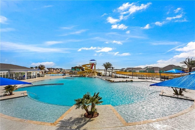 5520 Wake Reserve Rd, Slidell, LA 70461 - community pool featuring a patio