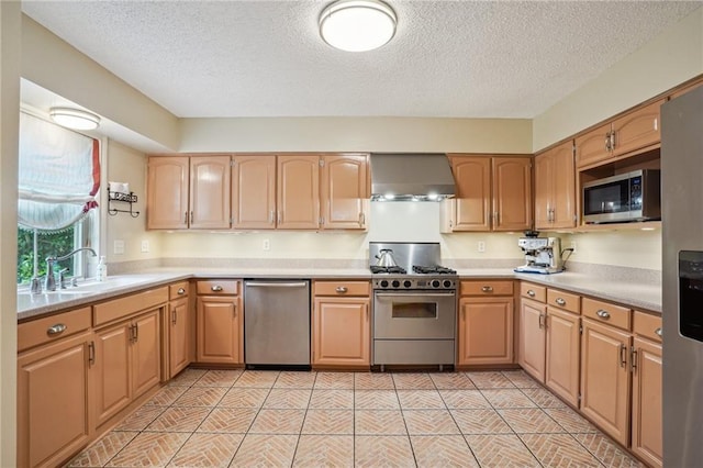 622 Pennsylvania Ave, Slidell, LA 70458 - kitchen featuring appliances with stainless steel finishes, light countertops, a sink, ventilation hood, and a textured ceiling