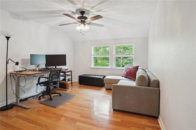 622 Pennsylvania Ave, Slidell, LA 70458 - office featuring lofted ceiling, a ceiling fan, baseboards, a textured ceiling, and wood finished floors