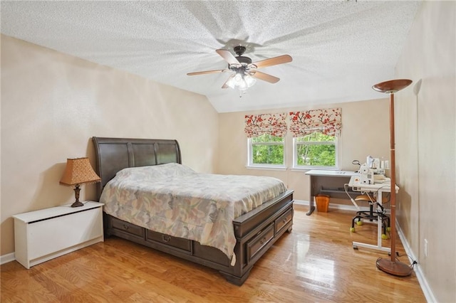 622 Pennsylvania Ave, Slidell, LA 70458 - bedroom with a textured ceiling and light wood finished floors