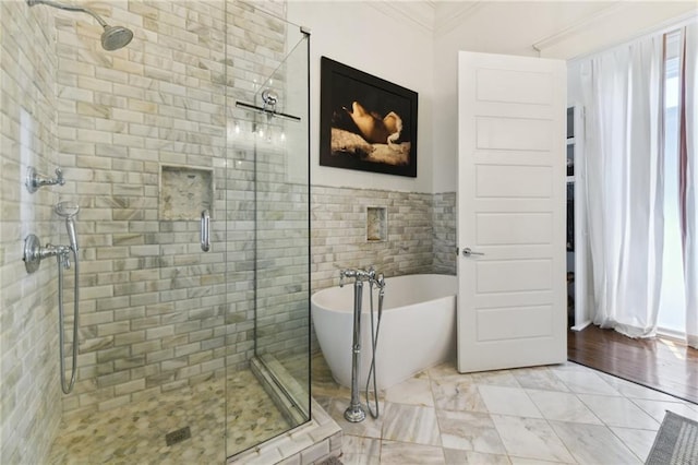 616 Cadiz St, New Orleans, LA 70115 - full bath featuring ornamental molding, a stall shower, and a soaking tub