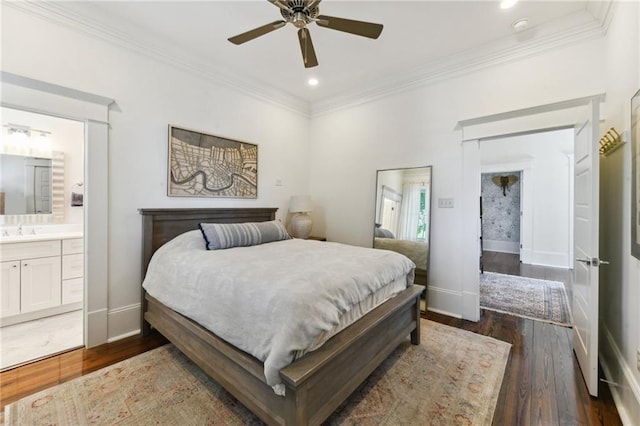 616 Cadiz St, New Orleans, LA 70115 - bedroom with crown molding, recessed lighting, a sink, and wood finished floors