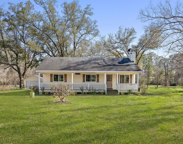 view of front of home with a garage, a porch, a chimney, and a front lawn