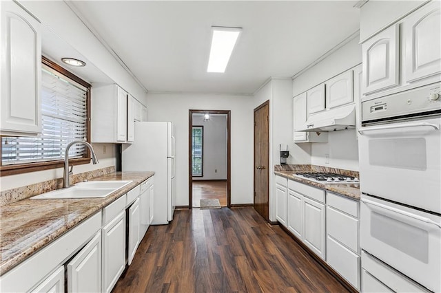 194 Sedgefield Dr, Harahan, LA 70123 - kitchen with white appliances, a sink, white cabinets, dark wood-style floors, and under cabinet range hood
