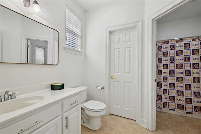 454 Rutherford Dr, Covington, LA 70433 - bathroom featuring toilet, vanity, a shower with curtain, and tile patterned flooring