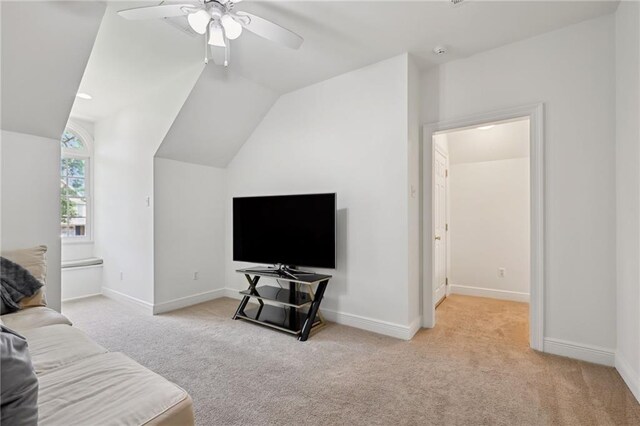 454 Rutherford Dr, Covington, LA 70433 - living room featuring lofted ceiling, ceiling fan, light carpet, and baseboards