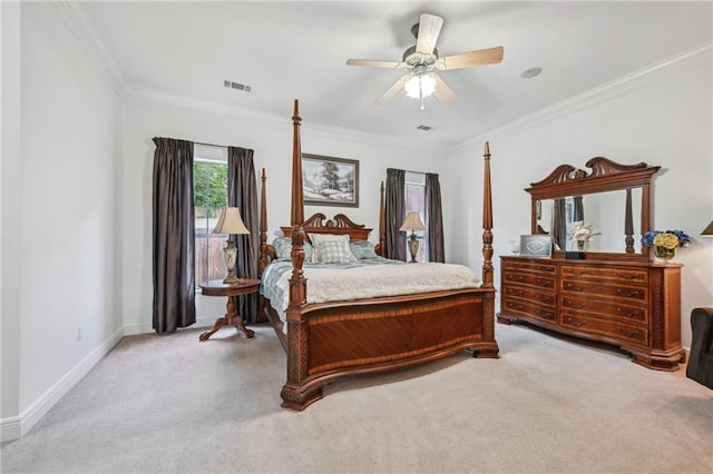 454 Rutherford Dr, Covington, LA 70433 - carpeted bedroom with baseboards, visible vents, ornamental molding, and a ceiling fan
