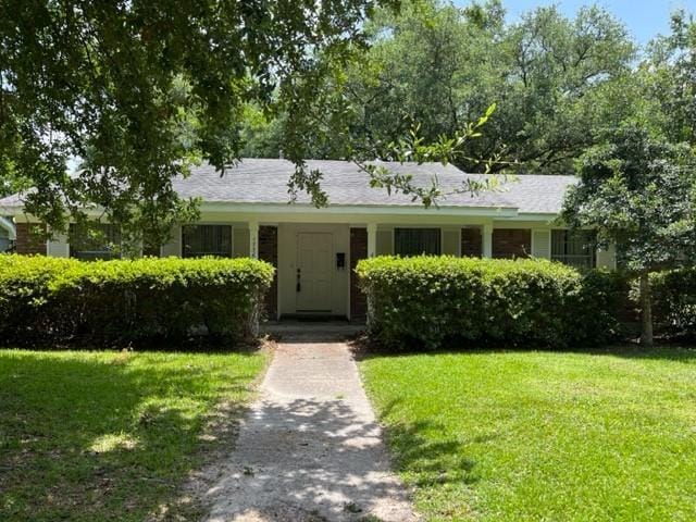 1736 11th St, Slidell, LA 70458 - view of front of house featuring a front lawn
