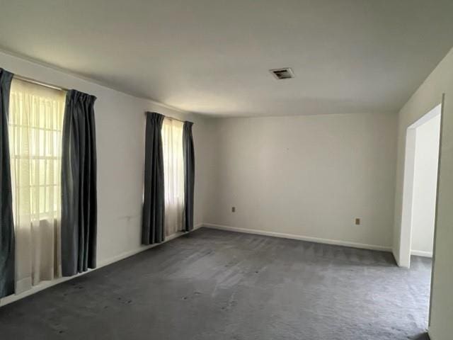 1736 11th St, Slidell, LA 70458 - empty room with carpet flooring and baseboards