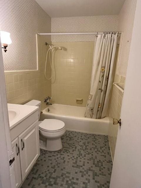 1736 11th St, Slidell, LA 70458 - full bath with tile walls, shower / bathtub combination with curtain, vanity, toilet, and tile patterned floors