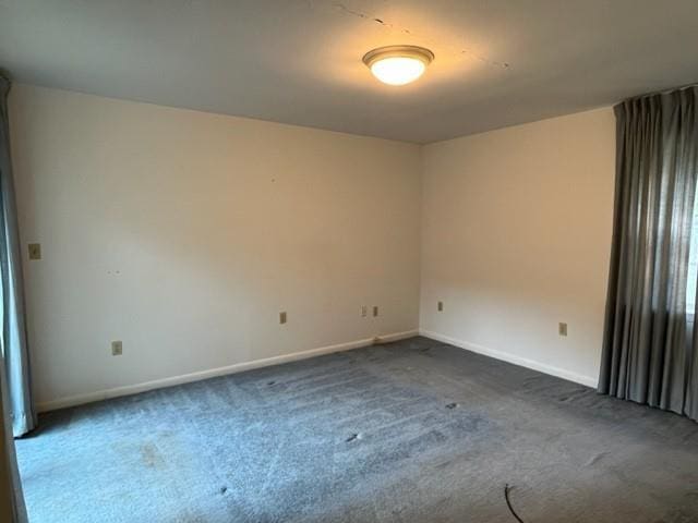 1736 11th St, Slidell, LA 70458 - spare room with dark colored carpet and baseboards