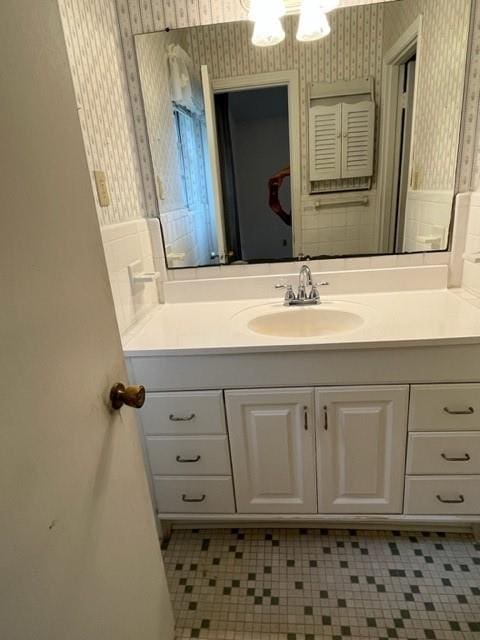 1736 11th St, Slidell, LA 70458 - bathroom featuring wallpapered walls and vanity