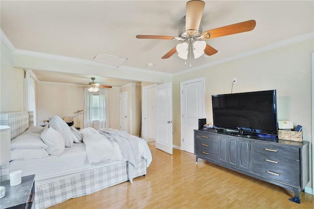 117 Diane Ave, River Ridge, LA 70123 - bedroom with crown molding, light wood-style flooring, a ceiling fan, and baseboards