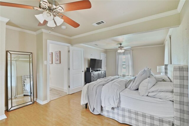117 Diane Ave, River Ridge, LA 70123 - bedroom with light wood-style flooring, ornamental molding, baseboards, and ceiling fan
