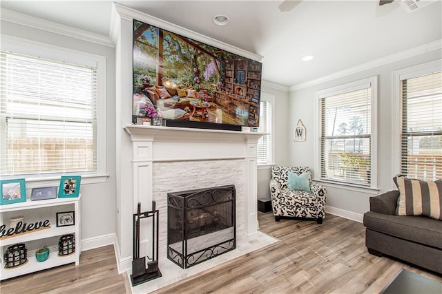 2329 Bradbury Pl, Covington, LA 70433 - living area featuring baseboards, ornamental molding, and wood finished floors