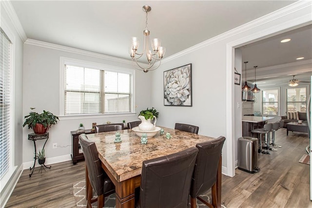 2329 Bradbury Pl, Covington, LA 70433 - dining room featuring crown molding, baseboards, recessed lighting, and dark wood-style floors