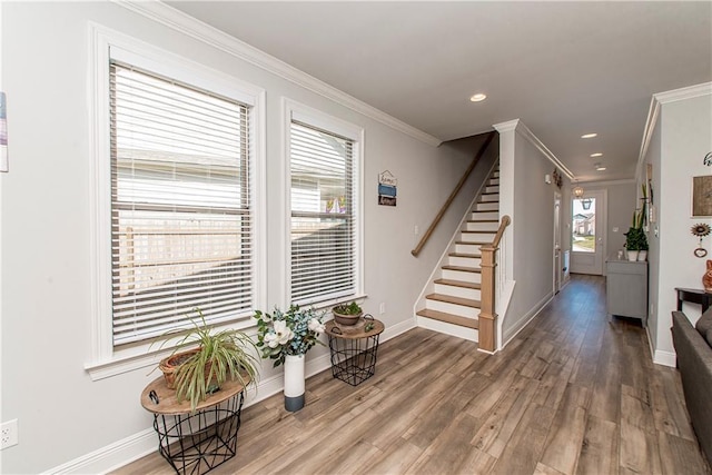 2329 Bradbury Pl, Covington, LA 70433 - entryway featuring crown molding, baseboards, stairs, and wood finished floors