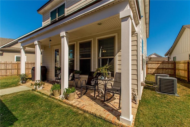 2329 Bradbury Pl, Covington, LA 70433 - exterior space featuring covered porch, fence, and central AC unit