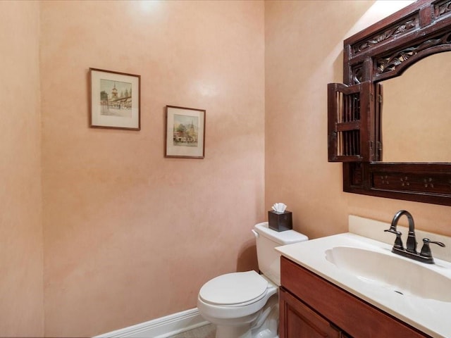 8063 Winners Cir, Mandeville, LA 70448 - half bath with toilet, vanity, and baseboards