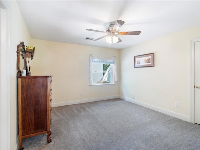 8063 Winners Cir, Mandeville, LA 70448 - unfurnished bedroom with light carpet, baseboards, and ceiling fan