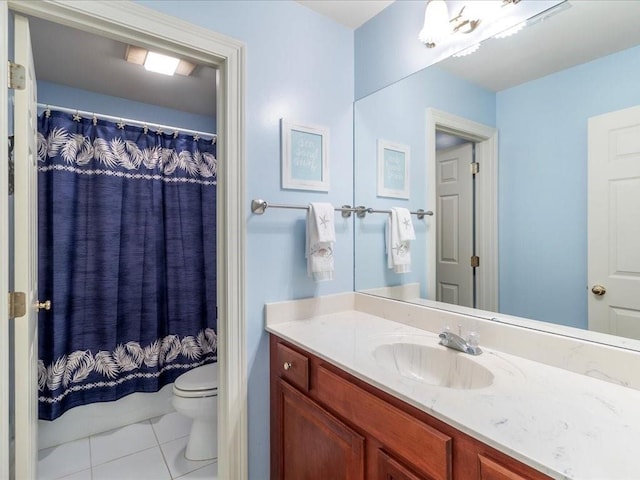 8063 Winners Cir, Mandeville, LA 70448 - full bathroom featuring toilet, tile patterned floors, vanity, and curtained shower