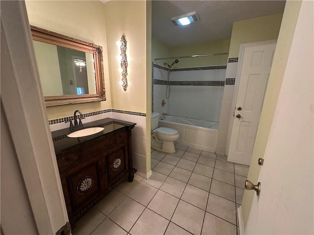 full bath with toilet, tile patterned flooring, shower / washtub combination, and vanity