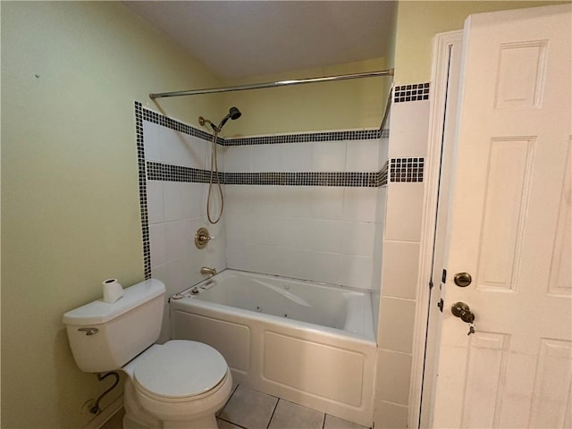 bathroom with toilet, shower / tub combination, and tile patterned flooring
