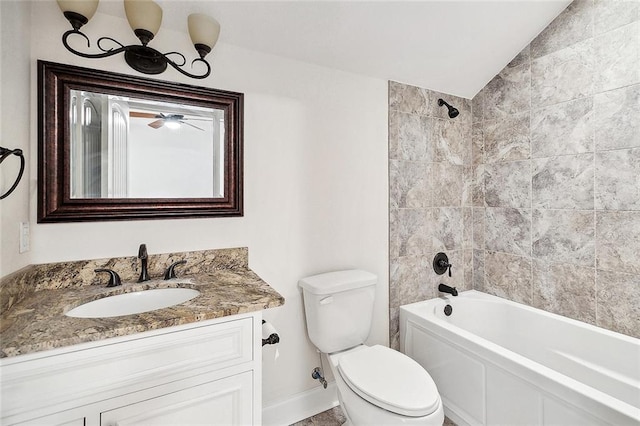 386 Marina Blvd, Mandeville, LA 70471 - bathroom with toilet, vanity, vaulted ceiling, washtub / shower combination, and baseboards