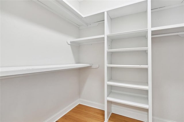 386 Marina Blvd, Mandeville, LA 70471 - spacious closet featuring wood finished floors