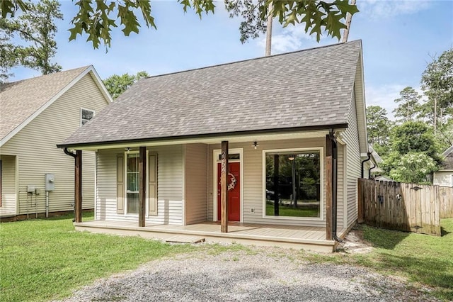 2254 9th St, Mandeville, LA 70471 - view of front of property featuring roof with shingles and covered porch