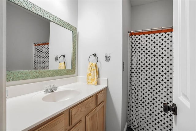 2254 9th St, Mandeville, LA 70471 - bathroom featuring vanity and curtained shower