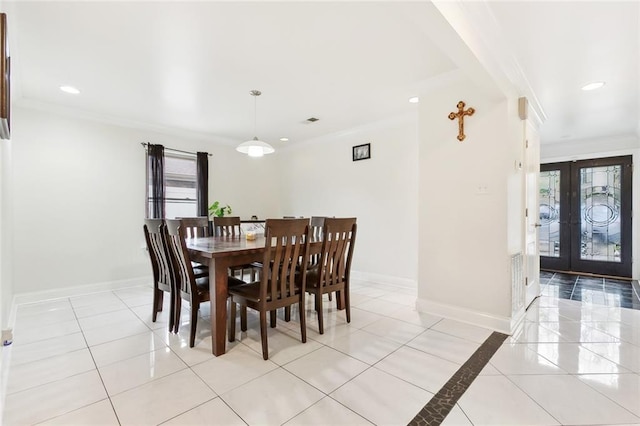 dining area featuring baseboards, recessed lighting, ornamental molding, and french doors