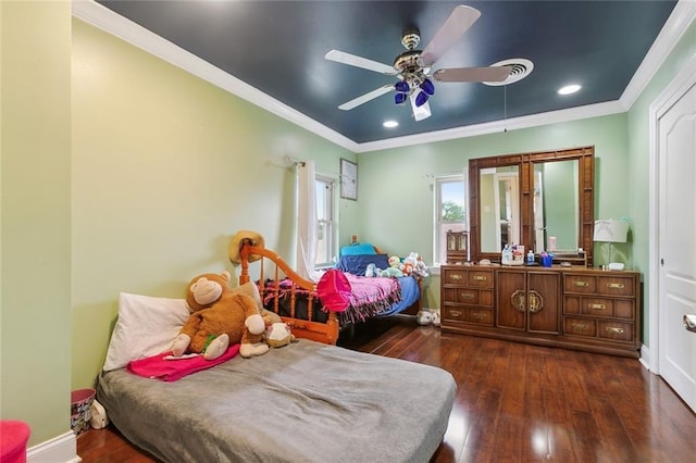 bedroom featuring dark wood finished floors, baseboards, ornamental molding, and recessed lighting