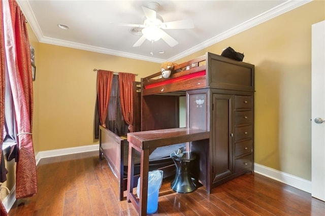 bedroom featuring baseboards, wood finished floors, a ceiling fan, and crown molding