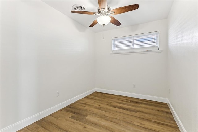 745 Oaklawn Dr, Metairie, LA 70005 - spare room with a ceiling fan, wood finished floors, and baseboards