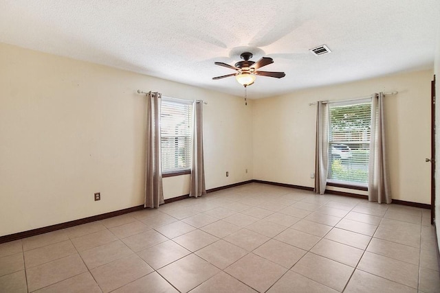 18 Landsdowne Ln, Destrehan, LA 70047 - empty room with baseboards, visible vents, ceiling fan, and light tile patterned flooring