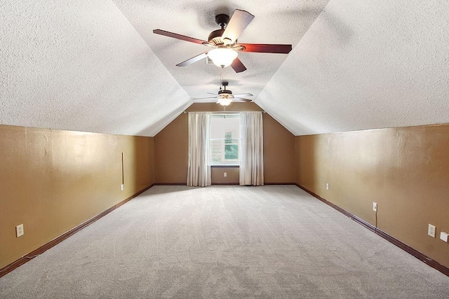 18 Landsdowne Ln, Destrehan, LA 70047 - bonus room featuring a textured ceiling, light colored carpet, and baseboards