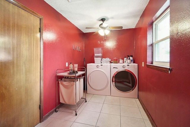 18 Landsdowne Ln, Destrehan, LA 70047 - clothes washing area with laundry area, light tile patterned floors, washing machine and dryer, a ceiling fan, and a textured ceiling