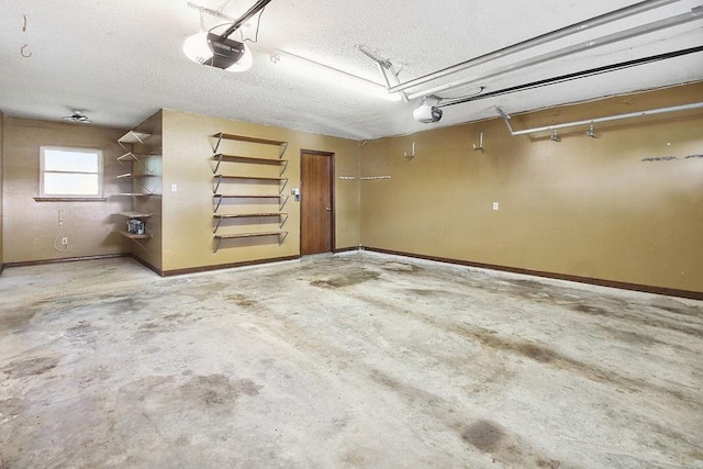 18 Landsdowne Ln, Destrehan, LA 70047 - garage with a garage door opener and baseboards