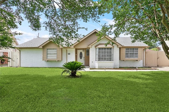 2140 Carol Sue Ave, Terrytown, LA 70056 - single story home featuring fence, a front yard, and brick siding