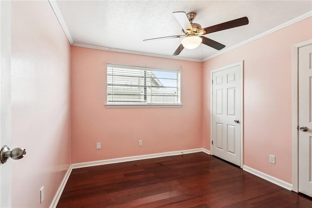 2140 Carol Sue Ave, Terrytown, LA 70056 - unfurnished bedroom with ceiling fan, ornamental molding, dark wood-style floors, and baseboards