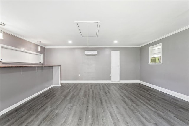 2140 Carol Sue Ave, Terrytown, LA 70056 - basement featuring crown molding, recessed lighting, wood finished floors, and baseboards