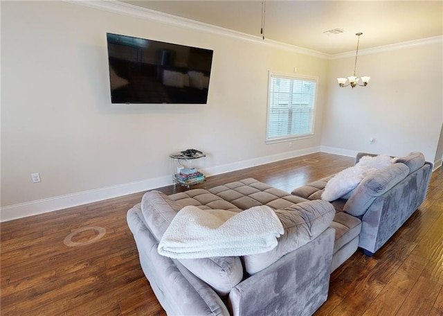 2680 Lavender St, New Orleans, LA 70122 - living room with wood finished floors, a chandelier, and ornamental molding