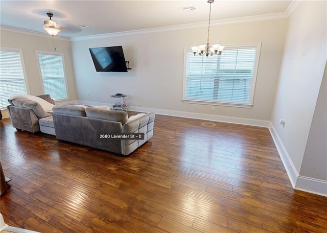 2680 Lavender St, New Orleans, LA 70122 - living room featuring hardwood / wood-style floors, a chandelier, and ornamental molding
