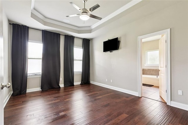 28230 Loiret Ct, Ponchatoula, LA 70454 - spare room featuring ornamental molding, a raised ceiling, a ceiling fan, and wood-type flooring