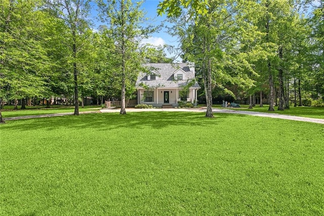 view of front of home with a front lawn