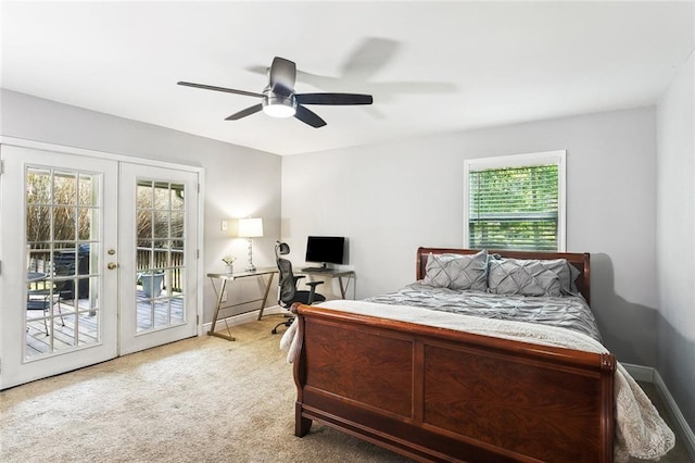 carpeted bedroom featuring baseboards, a ceiling fan, access to outside, and french doors